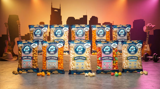 protein-popcorn-bags-with-nashville-background-high-protein-snack-display