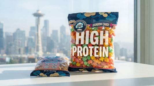 protein-popcorn-bag-with-seattle-skyline-in-background-high-protein-snack-hero-image