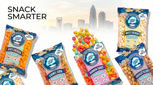 hero-image-of-protein-popcorn-with-charlotte-nc-skyline-and-snack-smarter-text