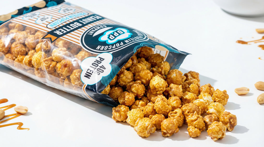 high-protein-popcorn-bags-and-popped-kernels-on-clean-white-tabletop