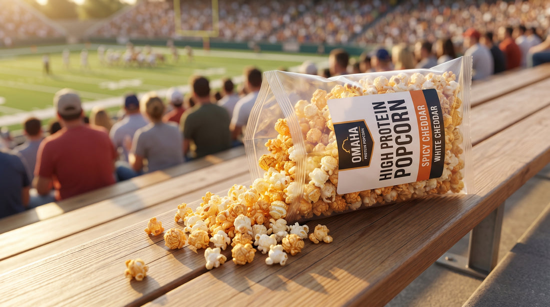 stadium-seat-with-bag-of-high-protein-popcorn-and-game-day-background