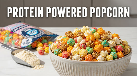 hero-image-of-high-protein-popcorn-with-whey-protein-scoop-and-popcorn-bag