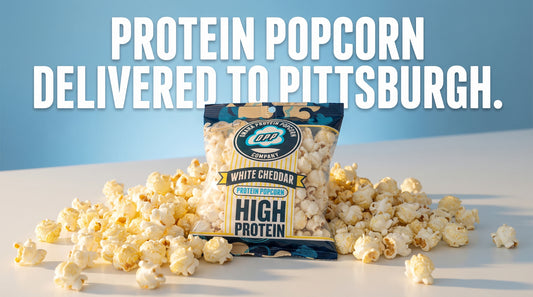 protein-popcorn-bag-with-high-protein-label-and-kernels-arranged-for-pittsburgh-delivery-theme