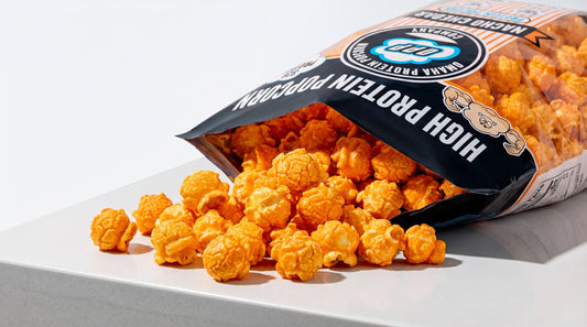 gourmet-protein-popcorn-bag-with-high-protein-popcorn-spilling-out
